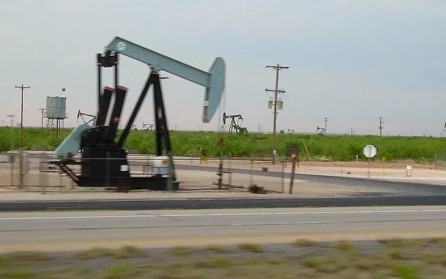 Field of oil pumpjacks along Interstate 20 near Midland, Texas