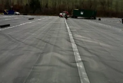 Full site containment liner on a well pad