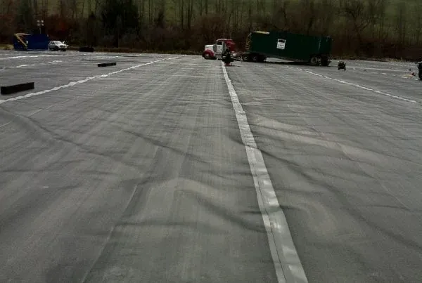 Primary containment liner laid across a well pad